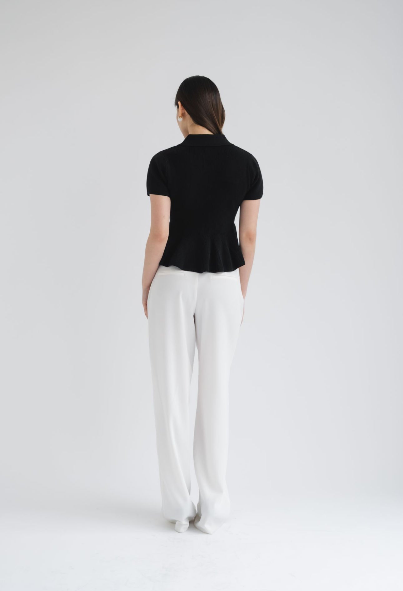 Zuri Polo Peplum Top | Black