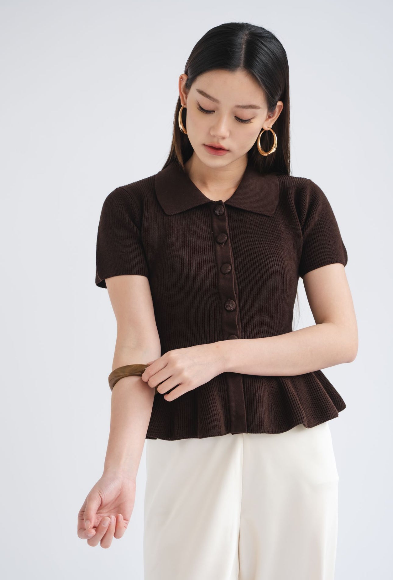 Zuri Polo Peplum Top | Truffle