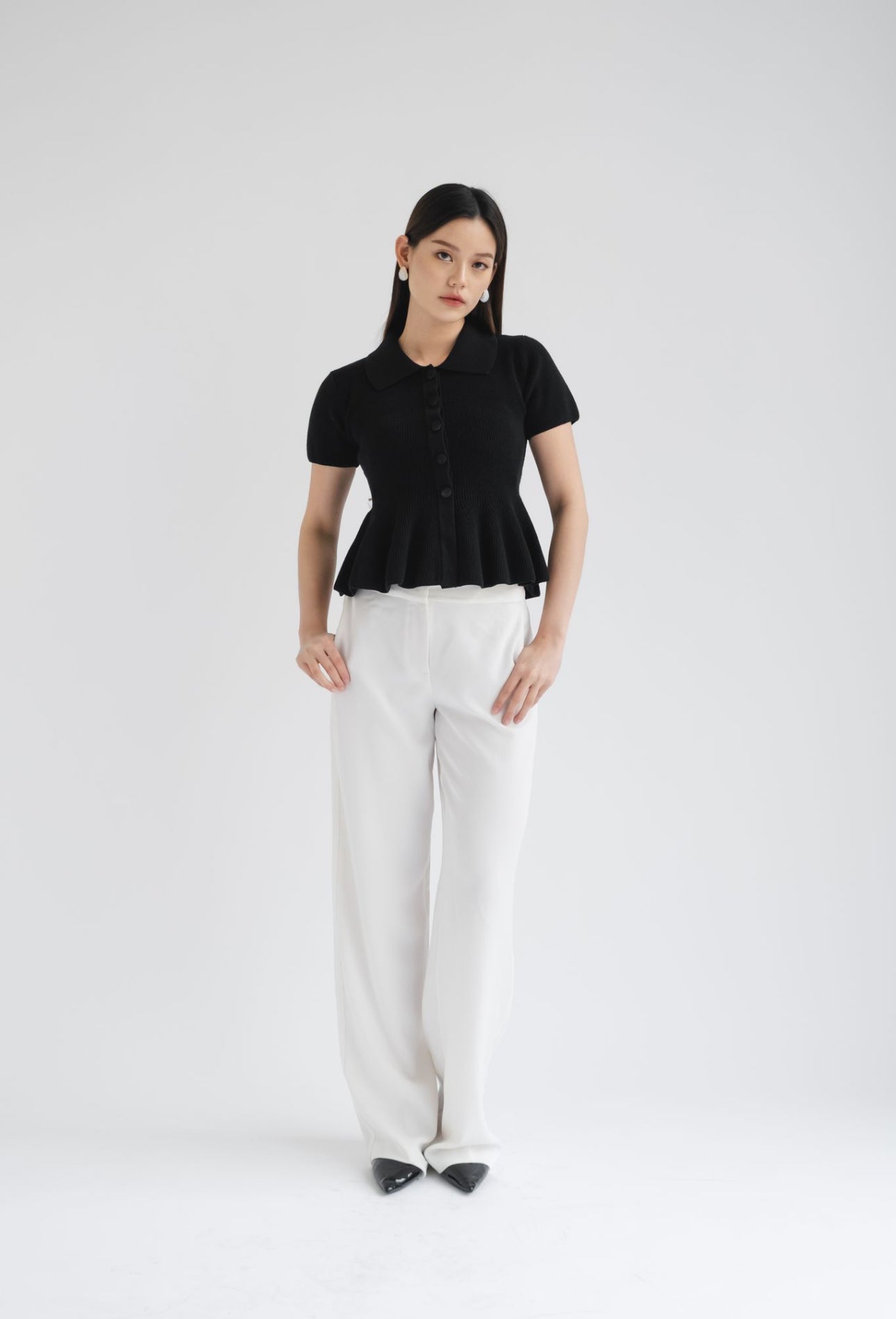 Zuri Polo Peplum Top | Black