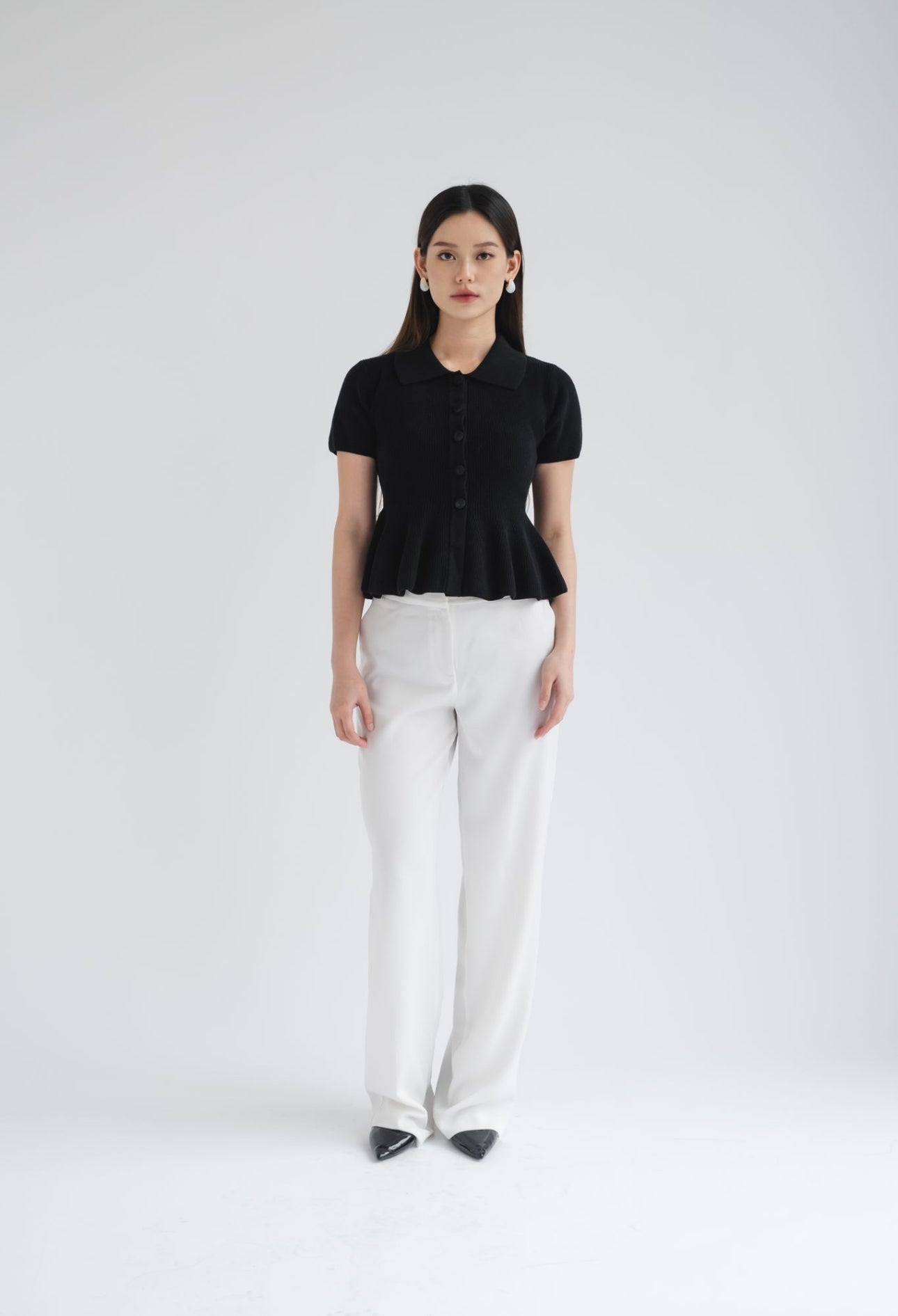 Zuri Polo Peplum Top | Black