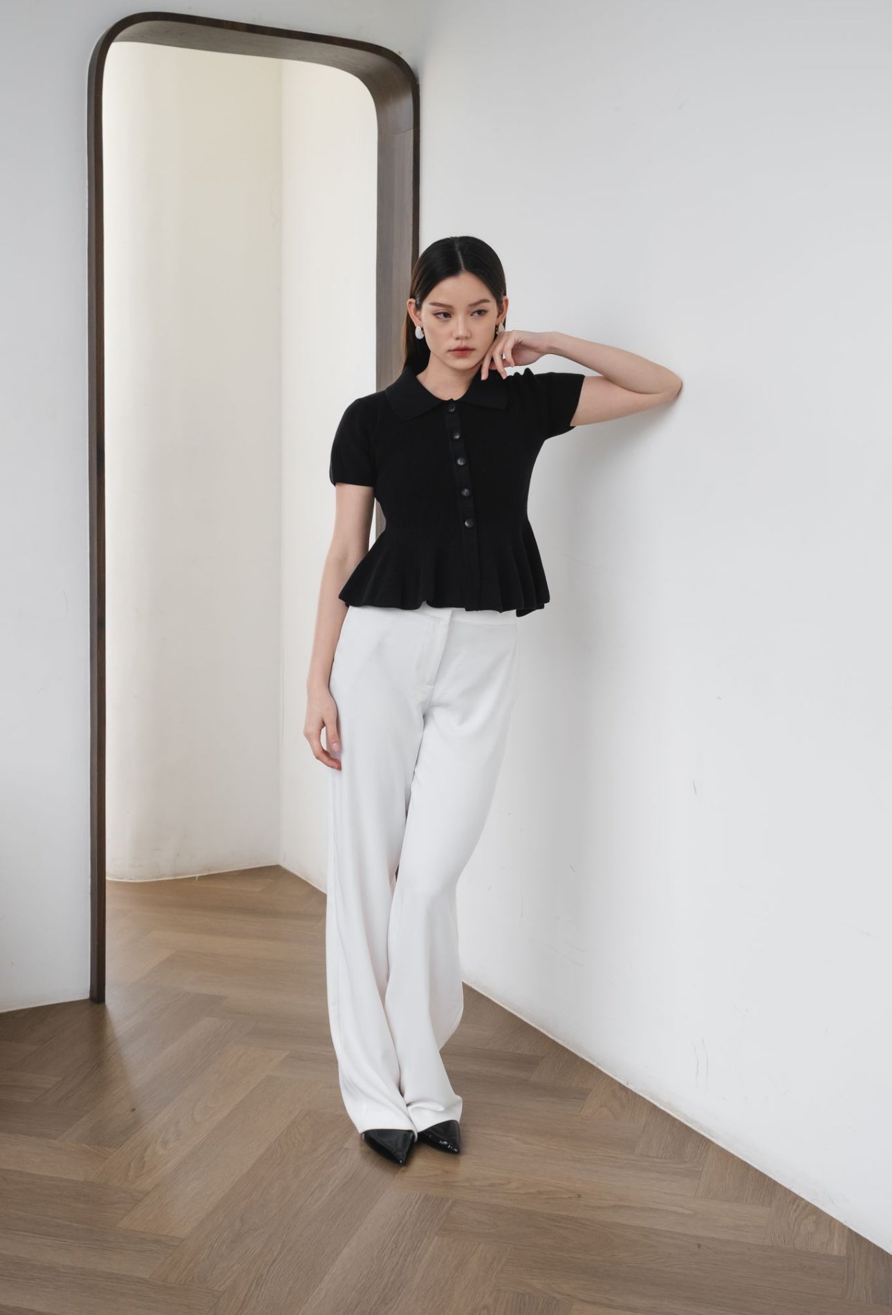 Zuri Polo Peplum Top | Black